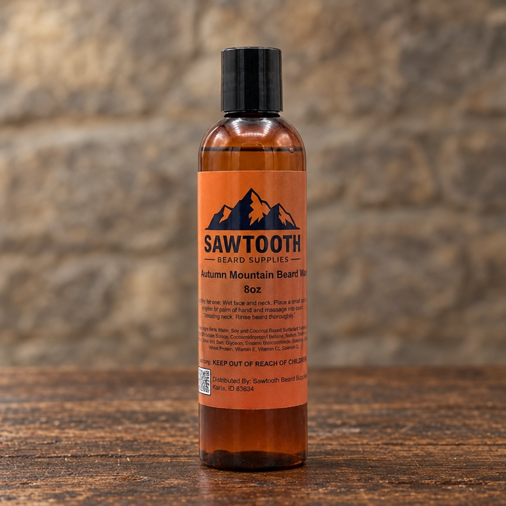 Autumn Mountain Beard Wash in its orange-labeled bottle on rustic wood against a stone backdrop